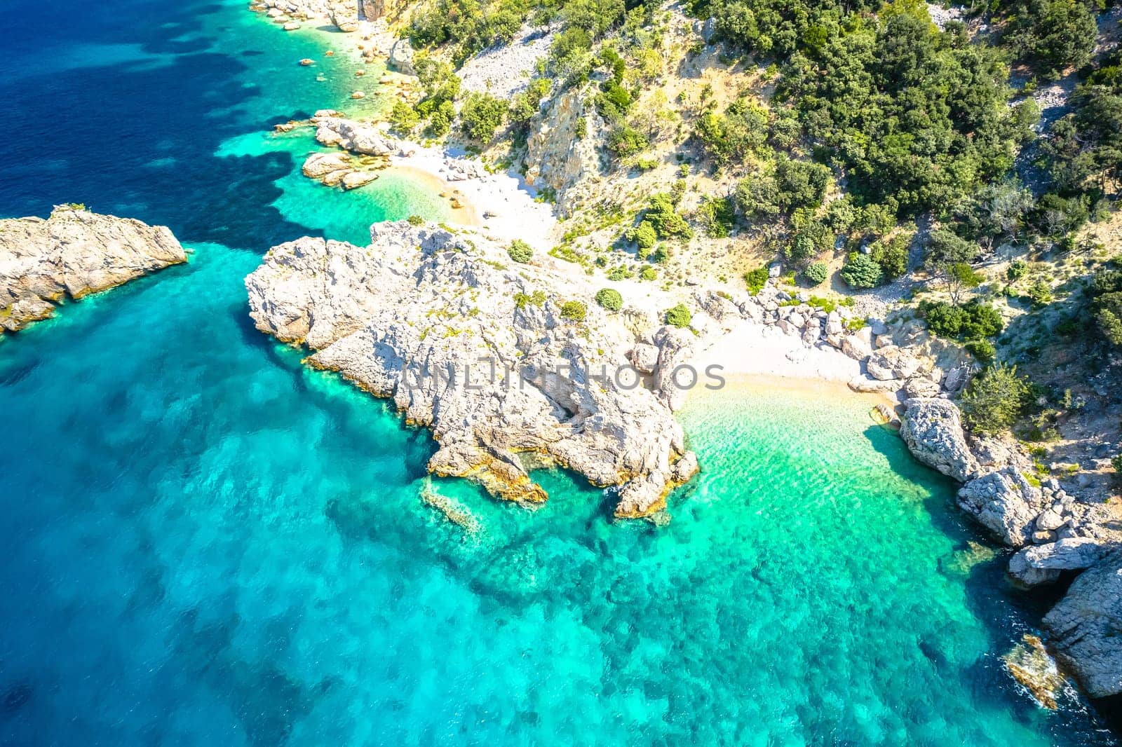 Idyllic hidden beach near Lubenice aerial view, Cres island of Croatia