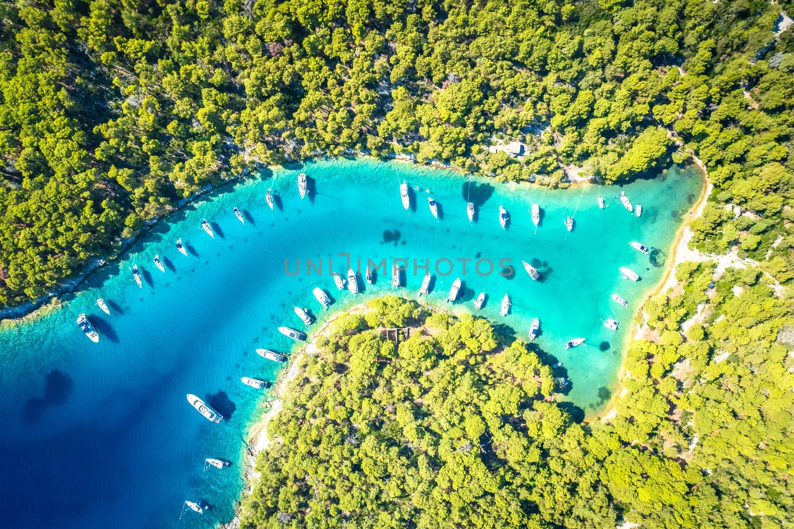 Turquoise sailing safe bay on Mali Losinj island aerial view, archipelago of Croatia