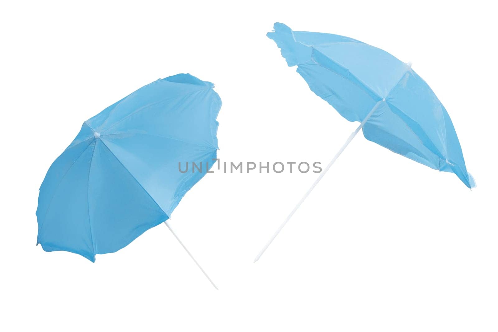 beach umbrellas in flight isolated on white, rest