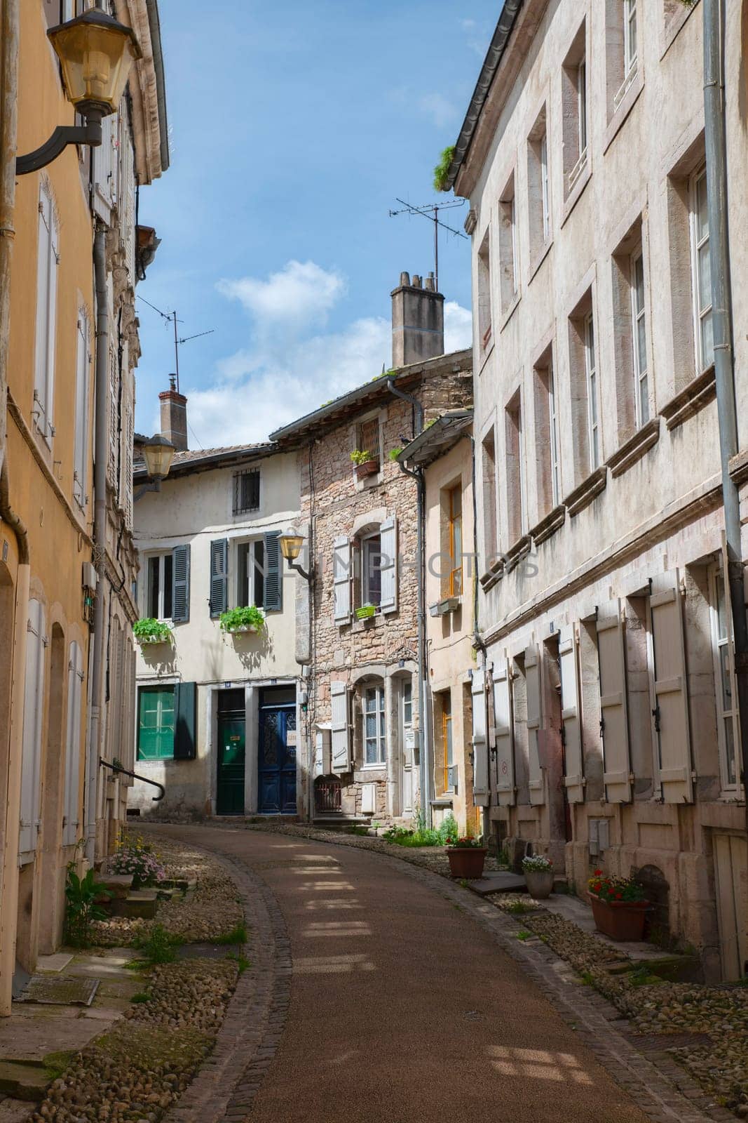street with old houses in the french city of tournus