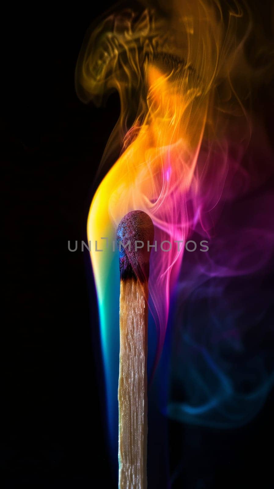 Close-up of a burning matchstick with colorful flames and smoke, artistic abstract concept.