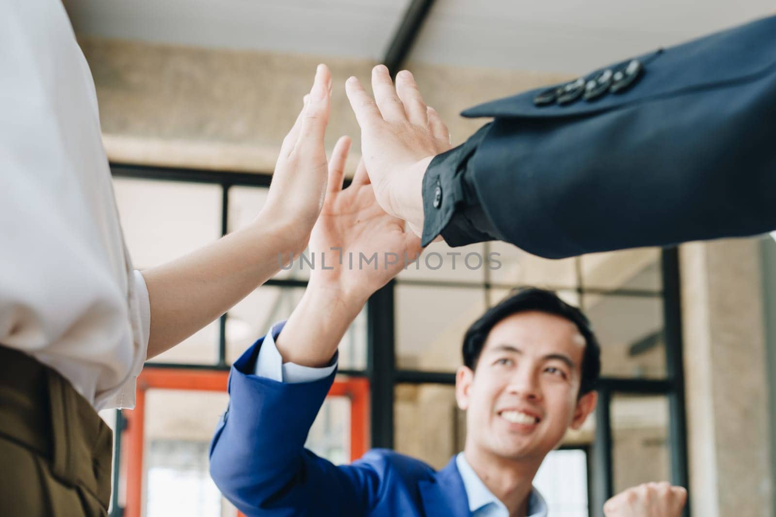Business Success concept with partner, Partnership Giving Fist Bump after Complete a deal. Successful Teamwork, Businessman with Team Agreement in Corporate