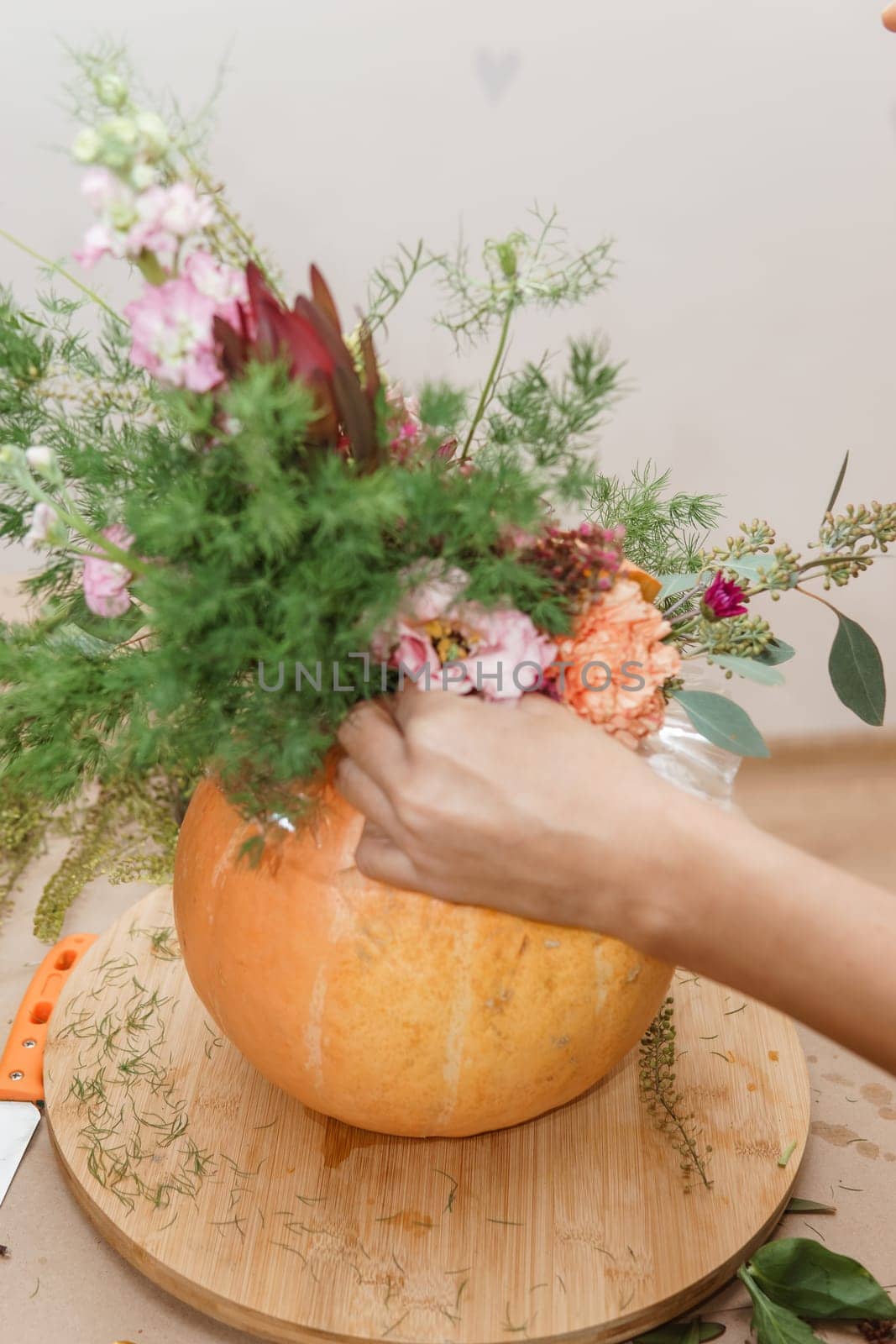 Creating a floral composition in a pumpkin. Making decor with your own hands