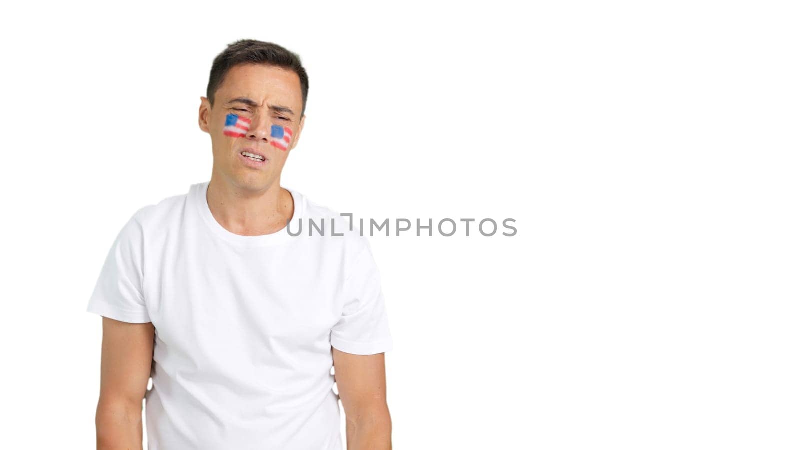 Nervous United States supporter during an exciting march that is ultimately lost