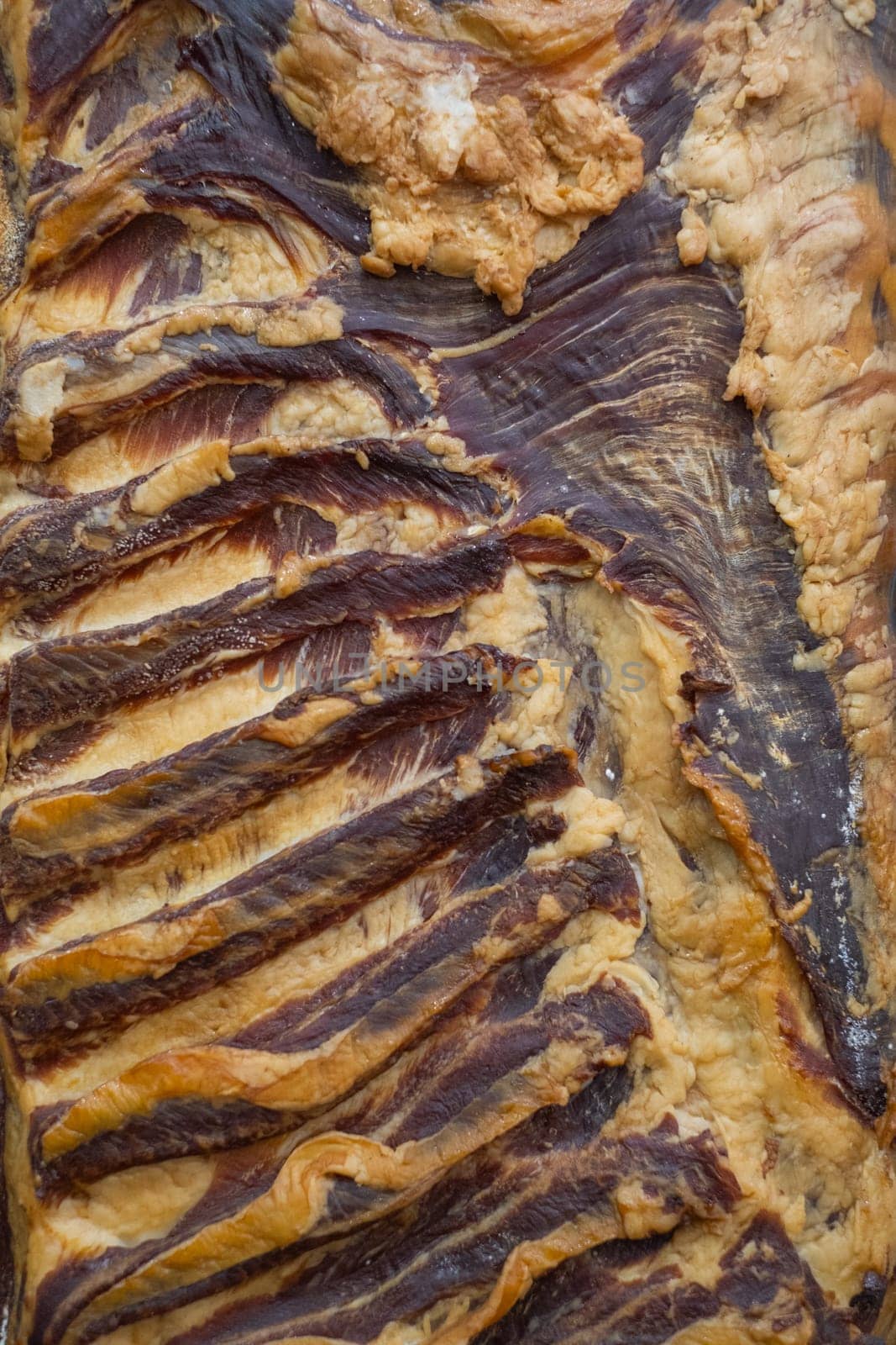 Smoked homemade sausages at the outdoors farmers market. close up view