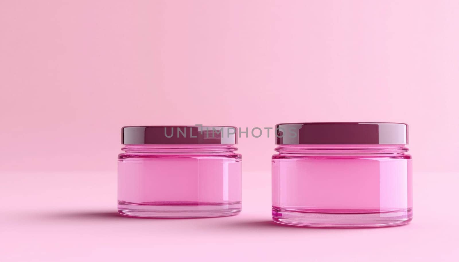 Two vibrant jars of creamy pink substance are positioned on a visually appealing pink background for aesthetics