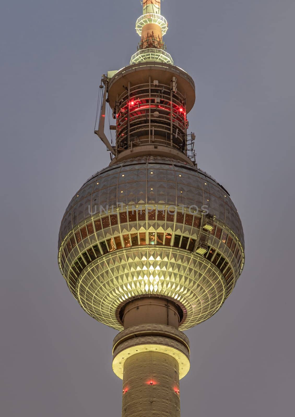 Berlin, Germany - Dec 18, 2023 - Famous Berlin Television Tower (Fernsehturm) with night sky background near Alexanderplatz in Berlin, A Tourist attraction and Meeting place, Copy space, Sective focus.