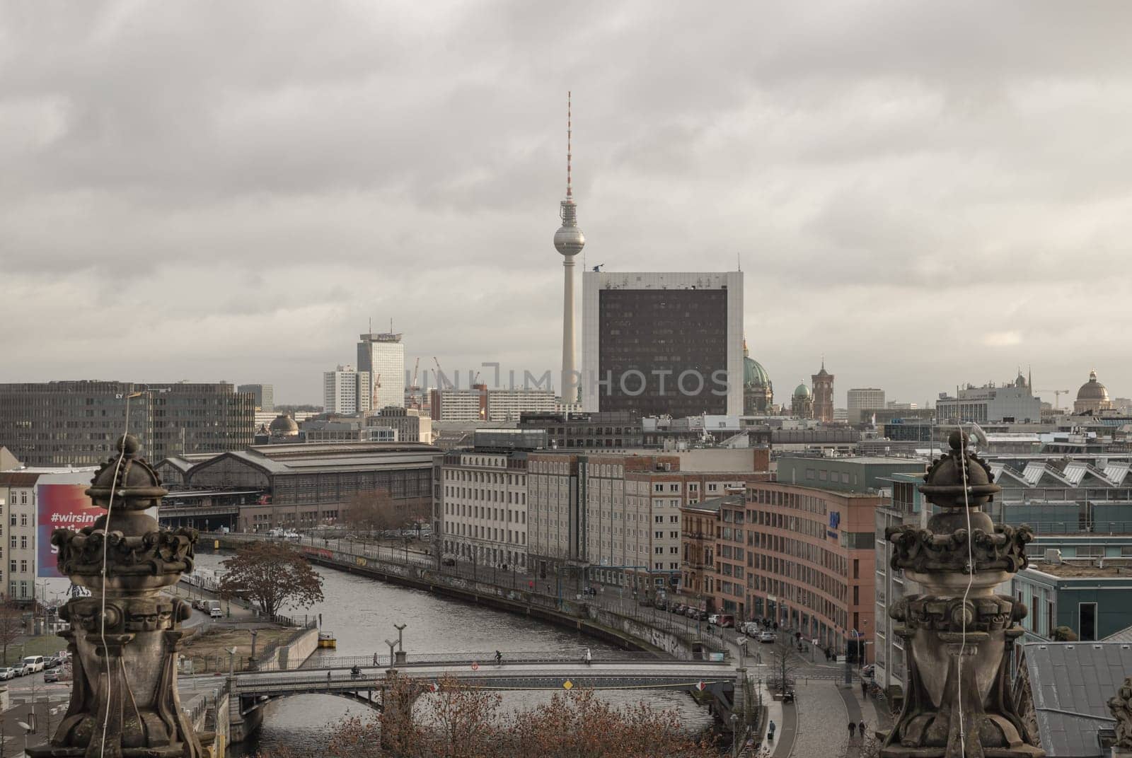 Berlin, Germany - Dec 20, 2023 - Berlin cityscape view from above of Reichstag building with Berlin Television Tower, Berliner Dom, Marschall Bridge, River Spree and buildings at the downtown Berlin. a major tourist attraction of the berlin city, Space for text, Selective focus.