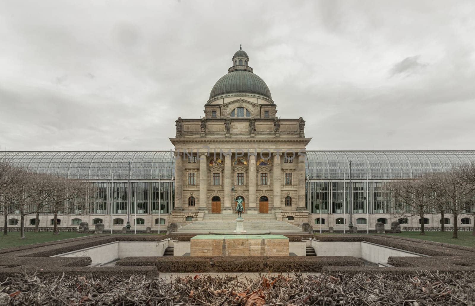 Munich, Germany - Dec 21, 2023 - Architecture exterior of Bayerische Staatskanzlei is a government building with Monument in front of entrance. Bavarian State Chancellery building (the former Bayerische Armeemuseum, Bavarian Army museum), Copy space, Selective focus.