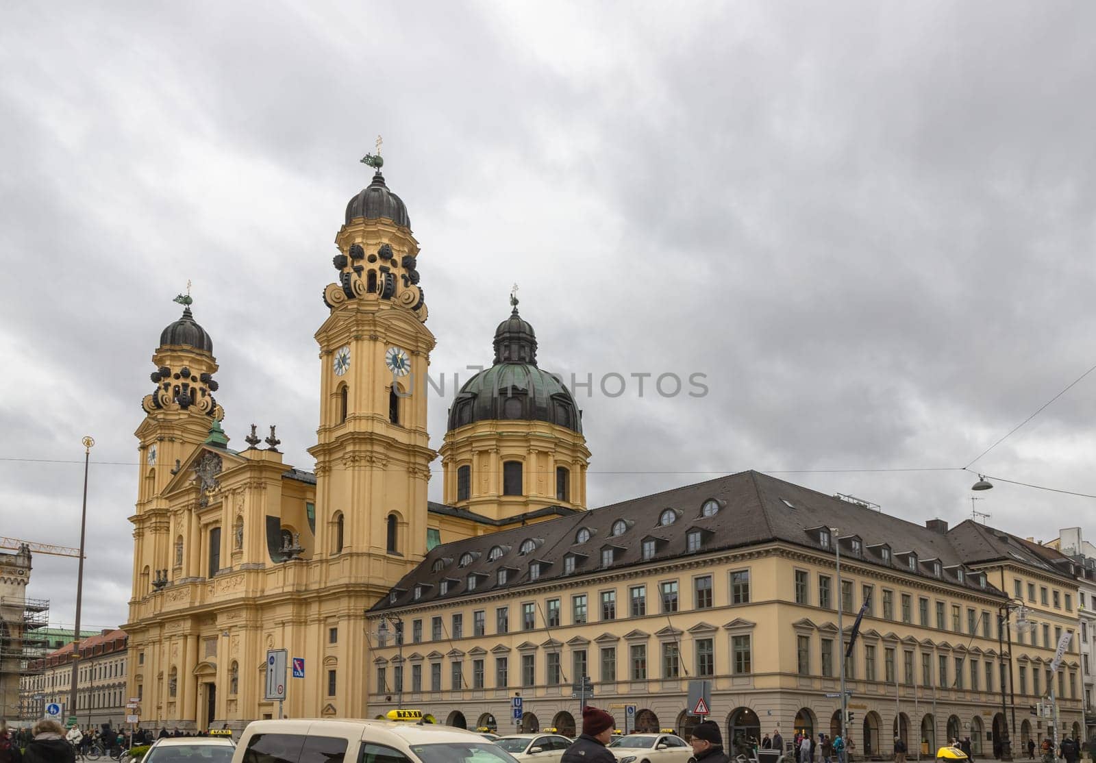 Munich, Germany - Dec 21, 2023 - Exterior architecture of The Theatine Church of St. Cajetan and Adelaide (Theatinerkirche St. Kajetan und Adelheid) a Catholic church on Odeonsplatz in Munich. Space for text, Selective focus.