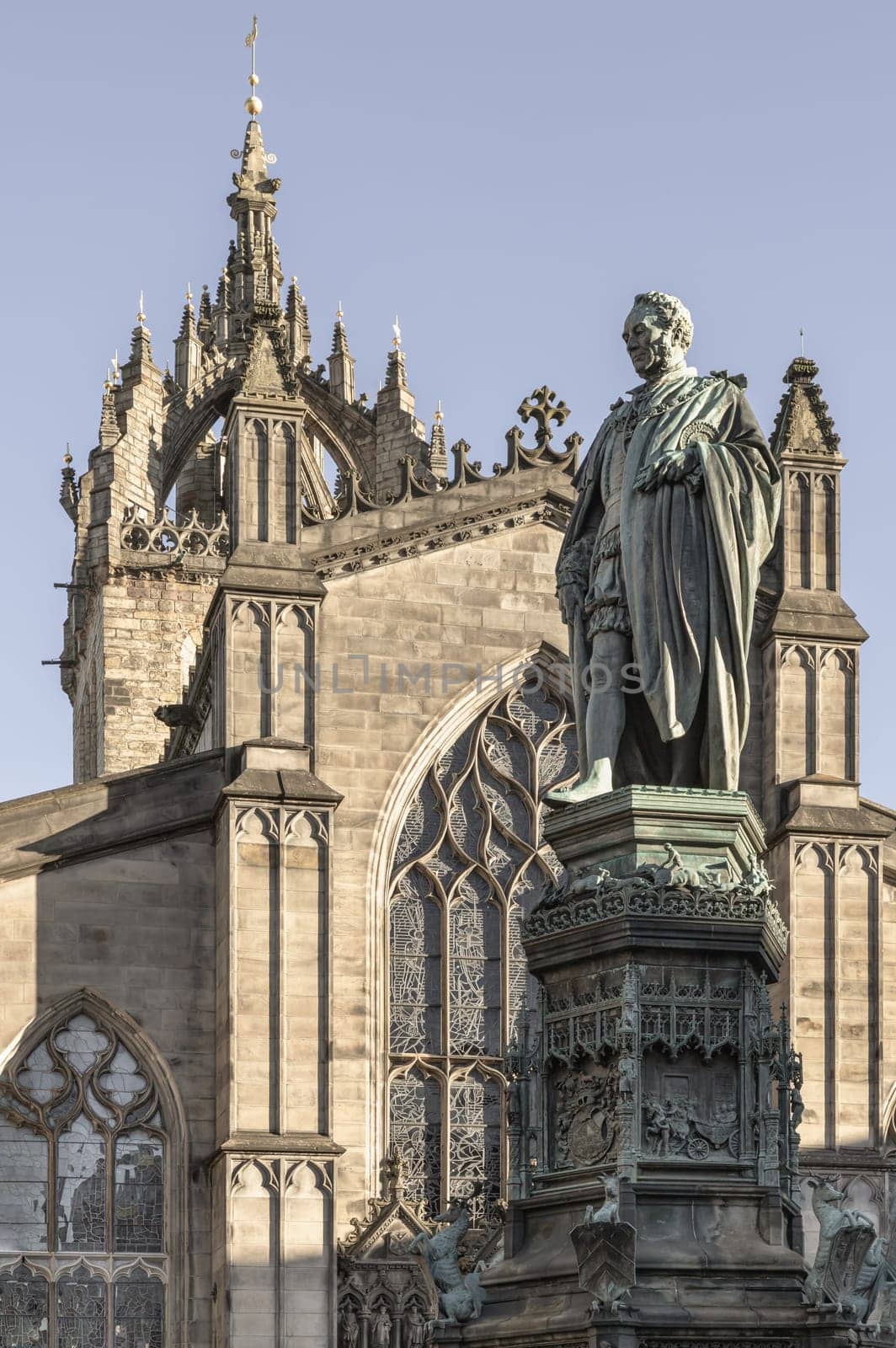 Edinburgh, Scotland - Jan 18, 2024 - Statue of Walter Francis Montagu Douglas Scott (Duke of Buccleuch) in front of St Giles' Cathedral or the High Kirk of Edinburgh. Copy space, Selective focus.