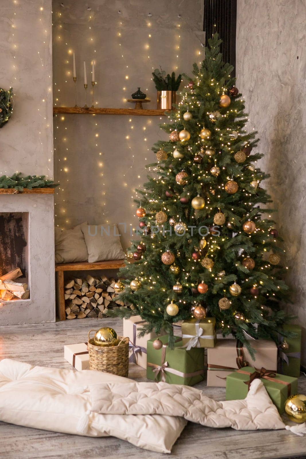 Home New Year's interior. Christmas tree with gifts, decorated with garlands. Cozy atmosphere of a home holiday, loft design of the room, Scandinavian style