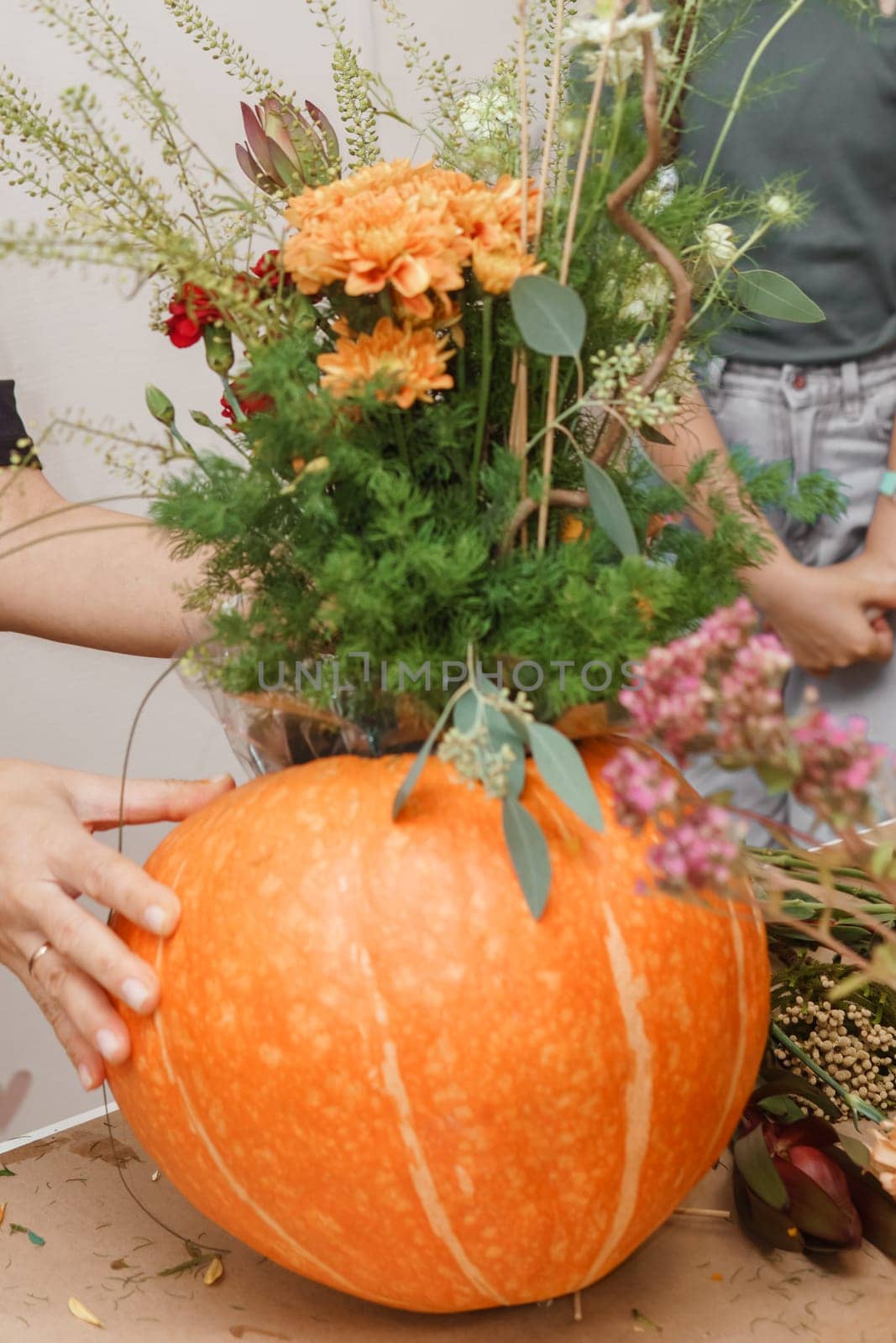 Creating a floral composition in a pumpkin. Making decor with your own hands