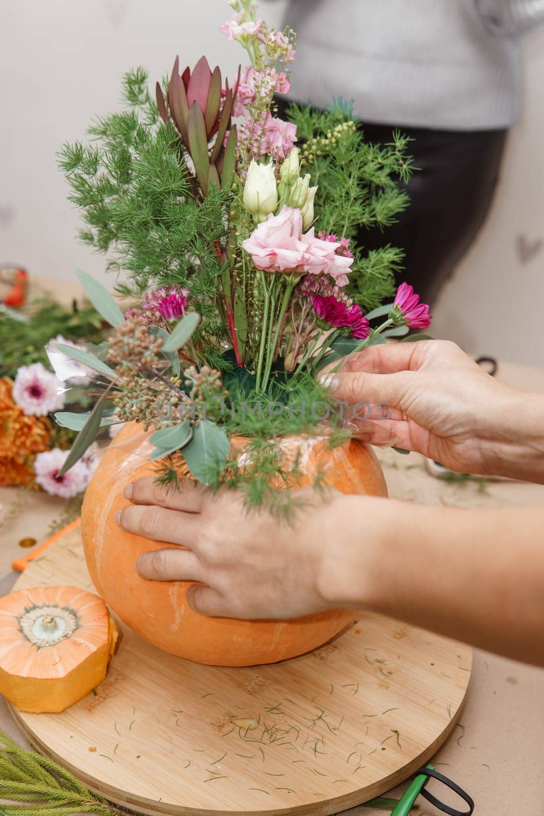 Creating a floral composition in a pumpkin. Making decor with your own hands