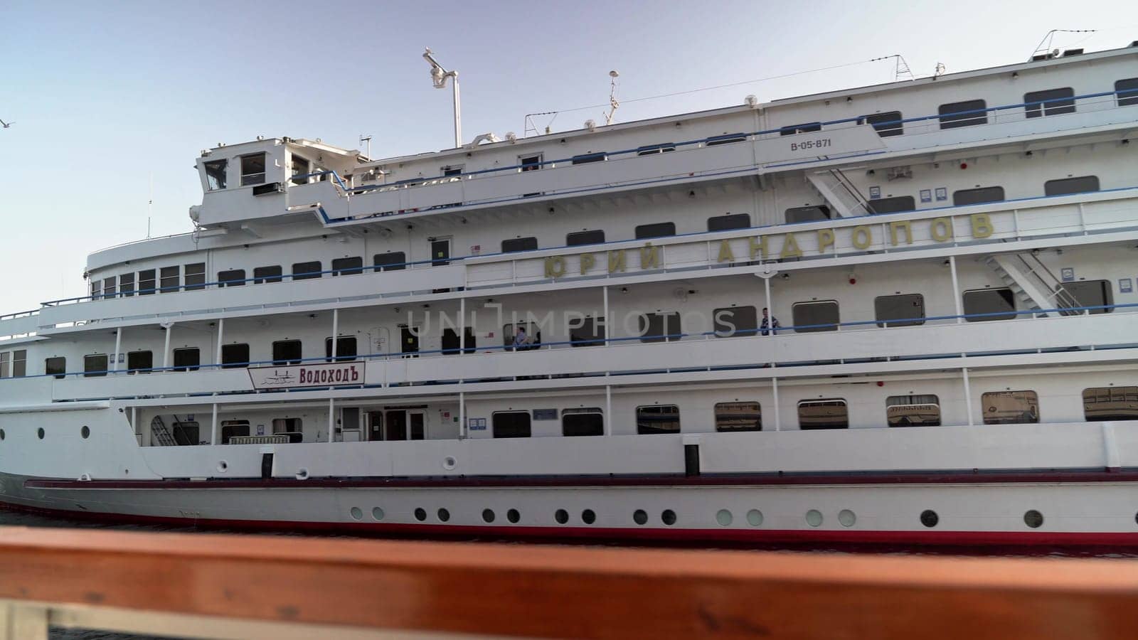 Russia, Valaam Island , July 27, 2024 -People aboard enjoy the picturesque views at sunset.