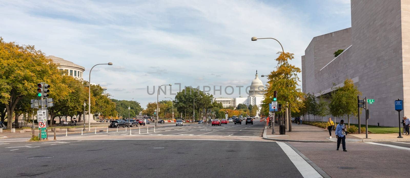 Washington DC, USA - Oct. 12, 2022: Busy street in Washington D.C., with contemporary architecture and people walking.