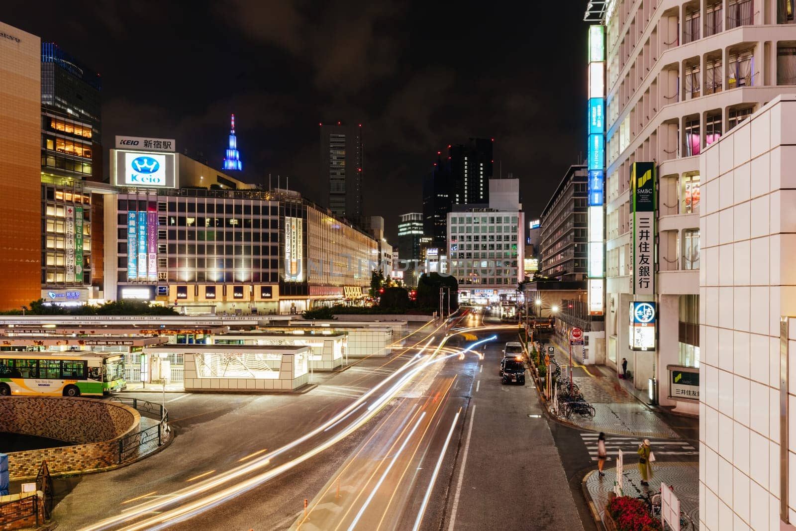 Shinjuku, Japan, 18 May 2019: Shinjuku station with bus terminal in Tokyo’s busy Shinjuku neighborhood at night