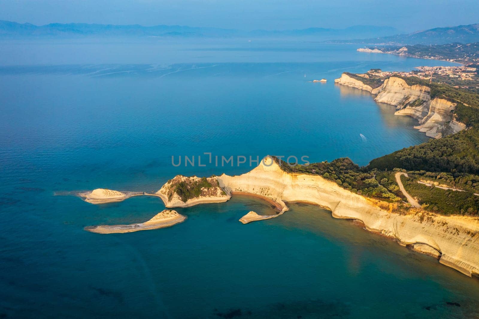 Beautiful view of Cape Drastis in the island of Corfu in Greece. Cape Drastis, the impressive formations of the ground, rocks and the blue waters panorama, Corfu, Greece, Ionian Islands.