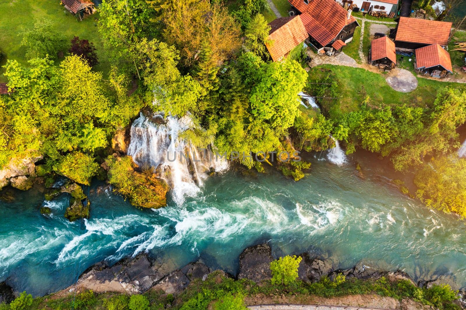 Village of Rastoke near Slunj in Croatia, old water mills on waterfalls of Korana river, beautiful countryside landscape. Landscape with river and little waterfalls in Rastoke village, Croatia.