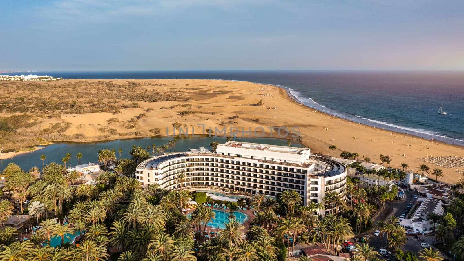 Landscape with Maspalomas town and golden sand dunes, Gran Canaria, Canary Islands, Spain. Natural Reserve of Dunes of Maspalomas, in Gran Canaria, Canary Islands, Spain.