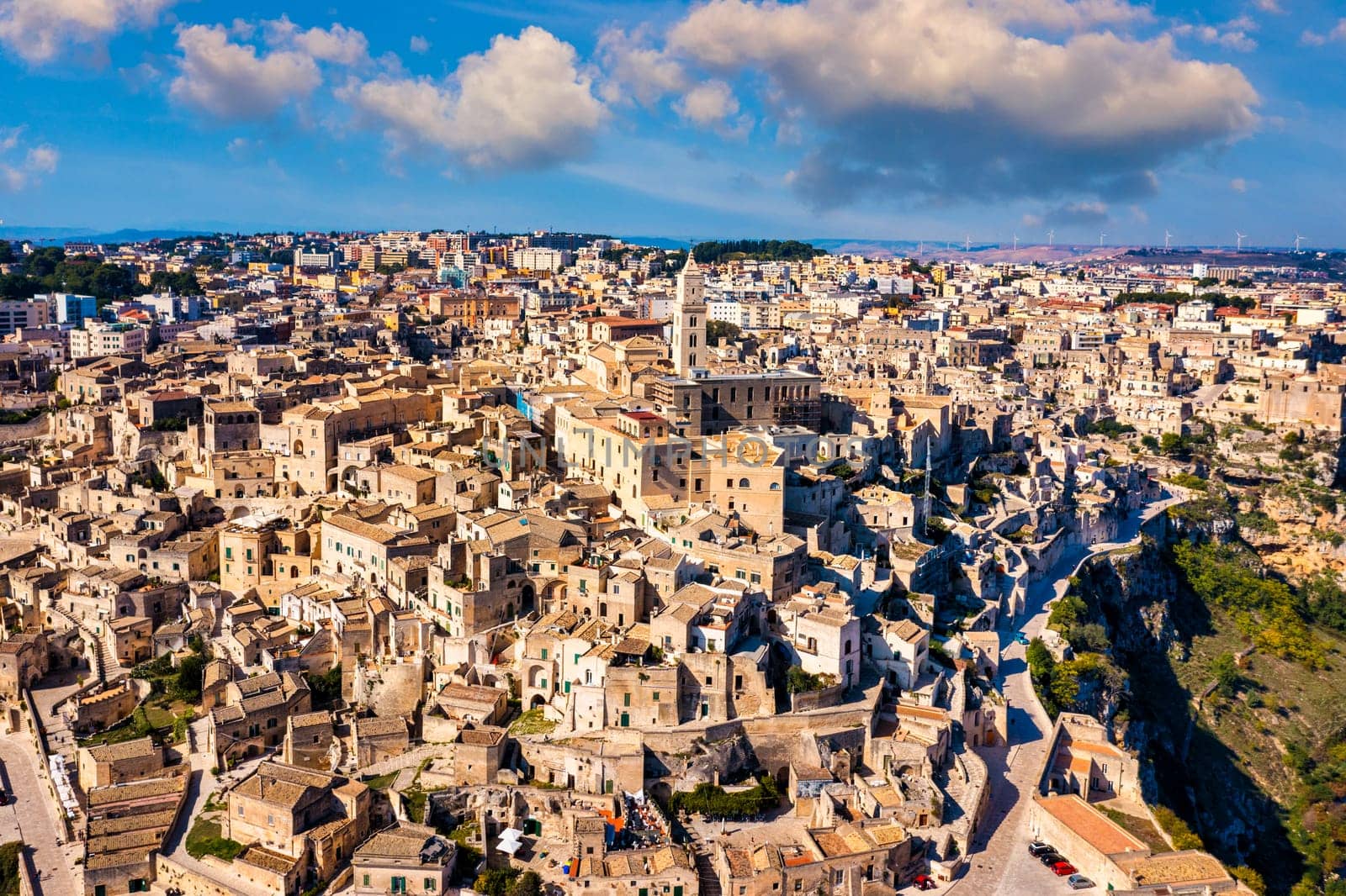Panoramic view of the ancient town of Matera (Sassi di Matera) in a beautiful autumn day, Basilicata, southern Italy. Stunning view of the village of Matera. Matera is a city on a rocky outcrop.