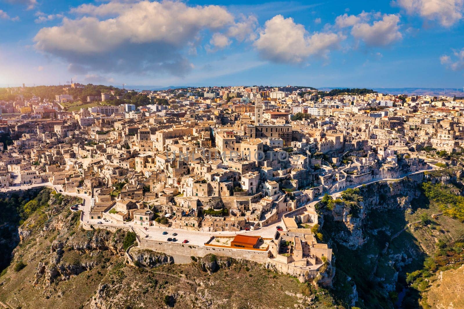 Panoramic view of the ancient town of Matera (Sassi di Matera) in a beautiful autumn day, Basilicata, southern Italy. Stunning view of the village of Matera. Matera is a city on a rocky outcrop.