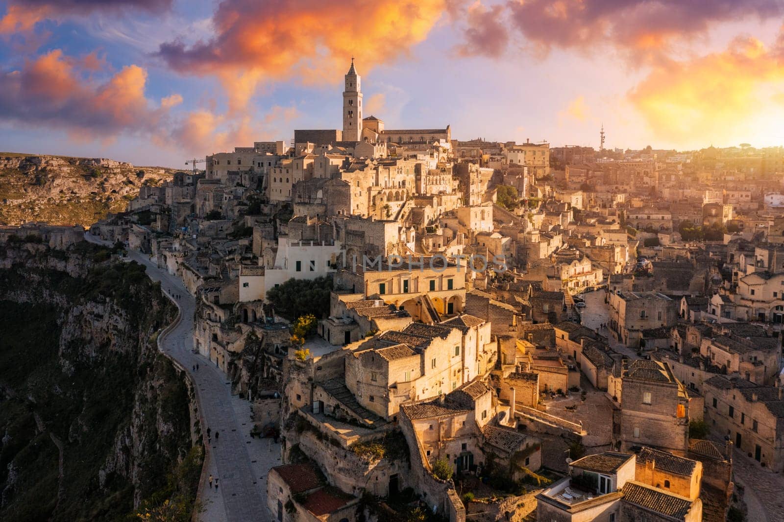Panoramic view of the ancient town of Matera (Sassi di Matera) in a beautiful autumn day, Basilicata, southern Italy. Stunning view of the village of Matera. Matera is a city on a rocky outcrop.