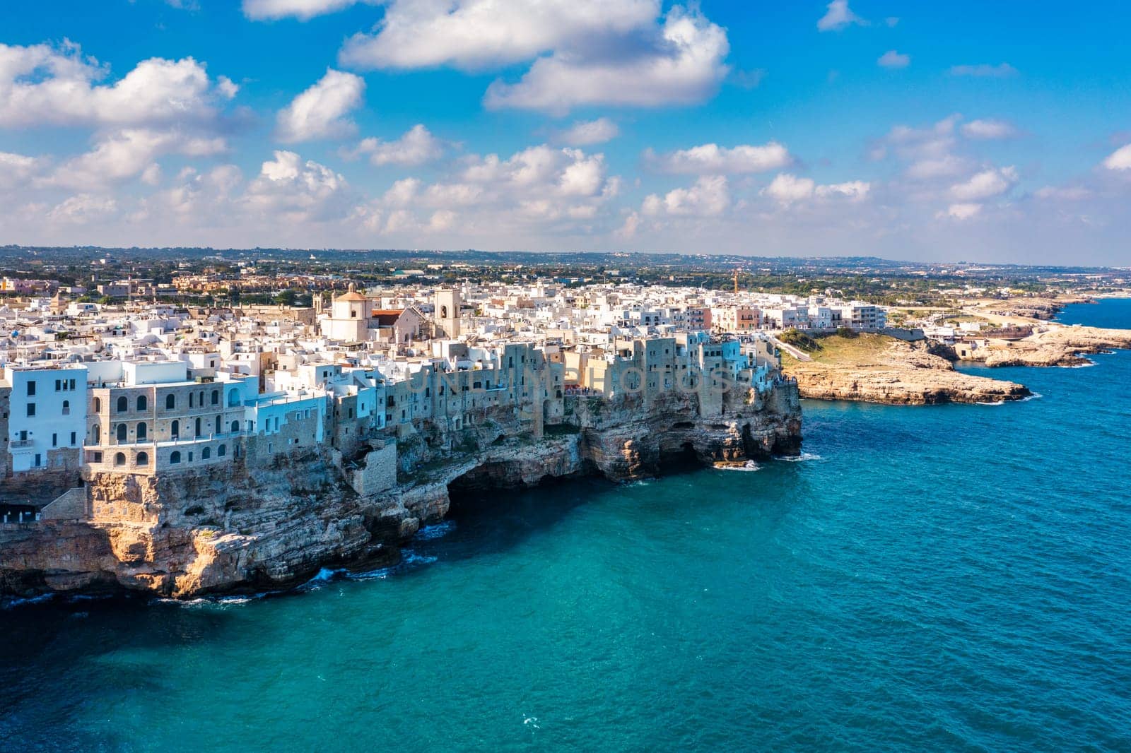Spectacular cityscape of Polignano a Mare town, Puglia region, Italy, Europe. Polignano Al Mare, scenic small town in Puglia, Italy. Polignano a Mare village on the rocks, Bari, Apulia, Italy. 