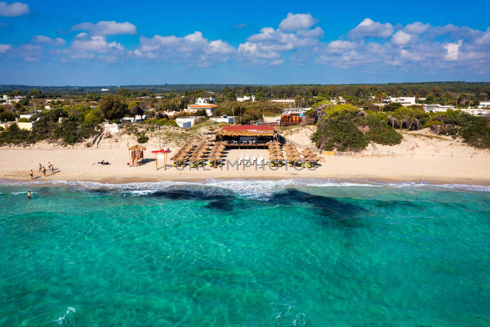 Punta Prosciutto is a wonderful beach of Salento coast, part of the Municipality of Porto Cesareo, Puglia region, South Italy. Punta Prosciutto in Apulia, one of the most beautiful beaches of Italy.