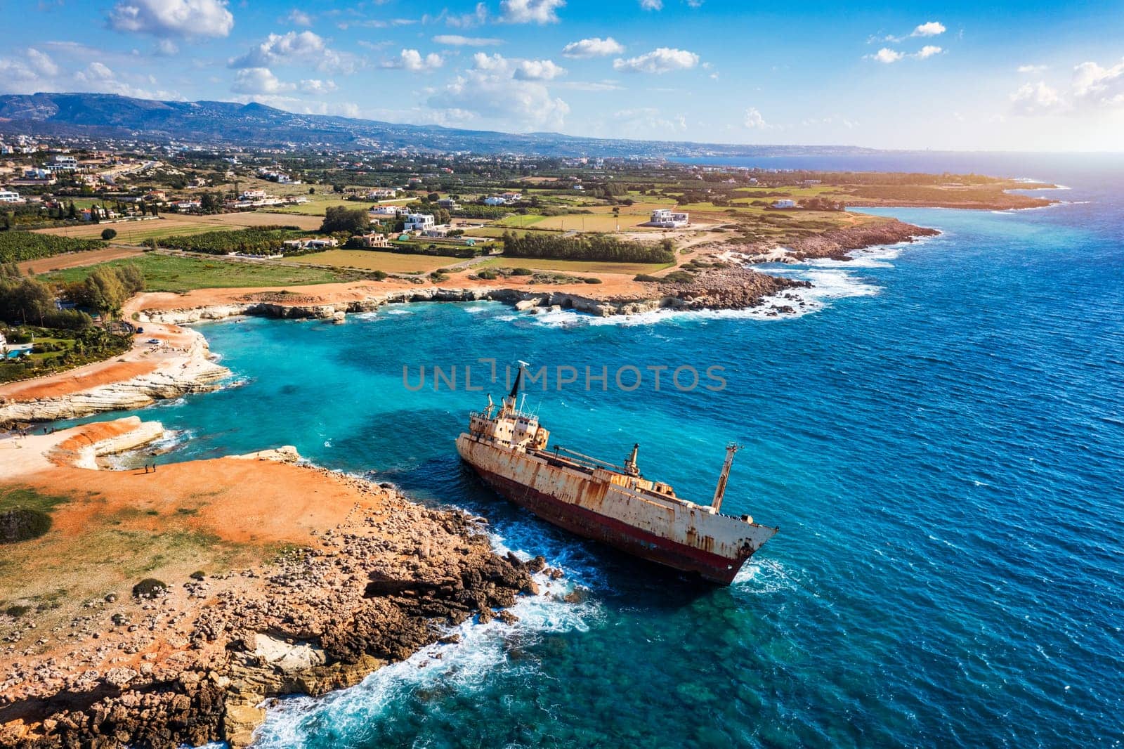 Abandoned Edro III Shipwreck at seashore of Peyia, near Paphos, Cyprus. Historic Edro III Shipwreck site on the shore of the water in Cyprus. Aerial view of Shipwreck EDRO III, Pegeia, Paphos.