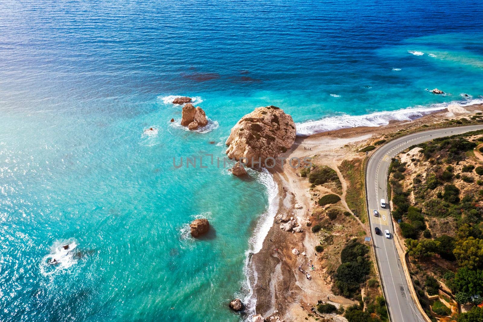 Petra tou Romiou (Aphrodite's Rock) the birthplace of Aphrodite, Paphos, Cyprus. Aerial view of Petra tou Romiou, aka Aphrodite's rock a famous tourist travel destination landmark in Paphos, Cyprus.
