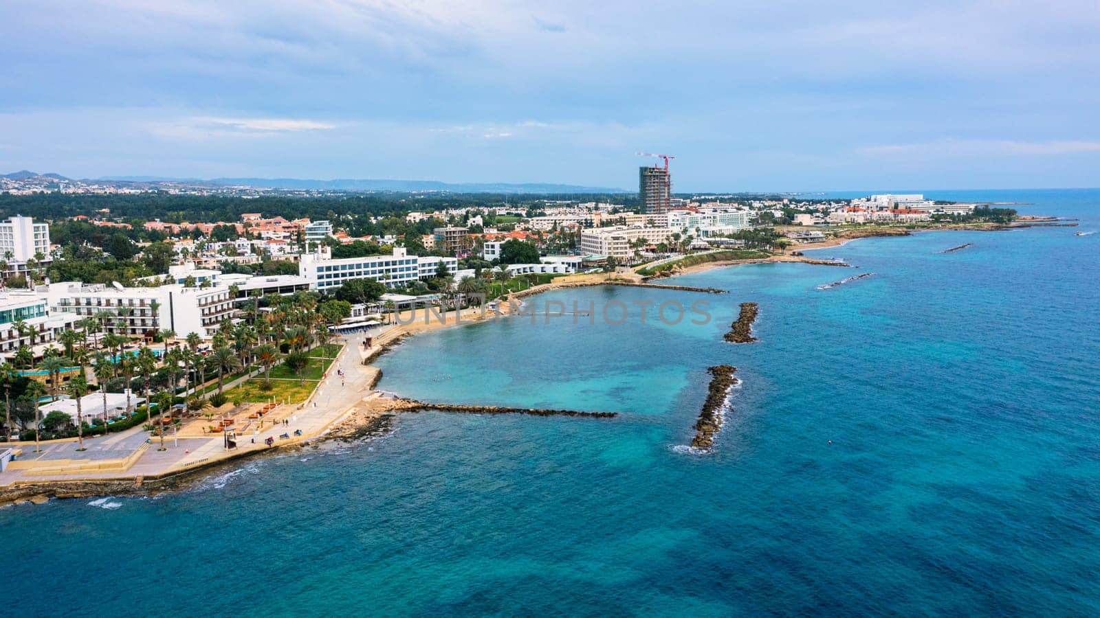 View of the town of Paphos in Cyprus. Paphos is known as the center of ancient history and culture of the island. View of embankment at Paphos Harbour, Cyprus.