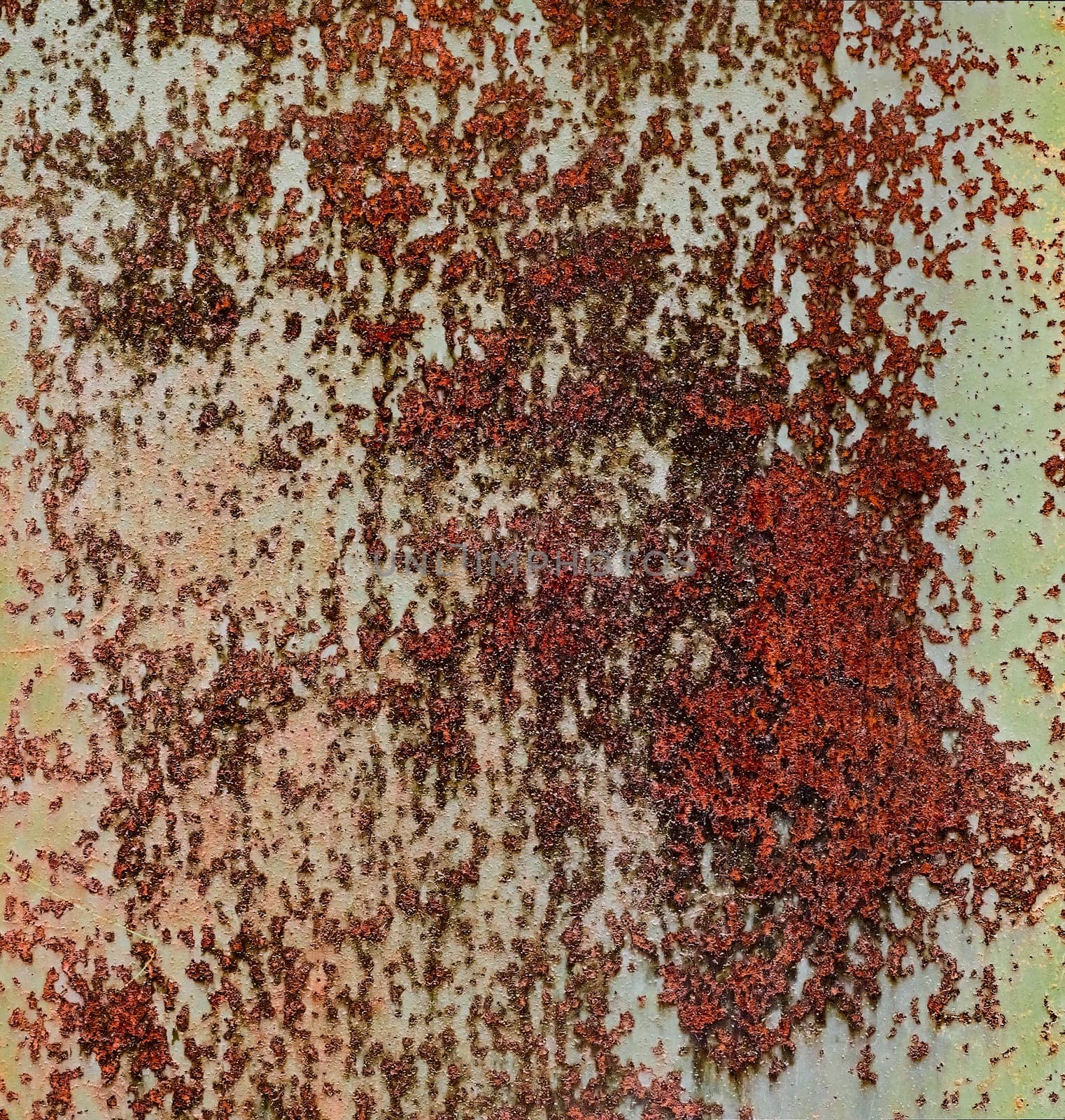 Detailed panorama grunge rusted metal texture. Backdrop of rusty surface of dark, brown, and orange hues. Close-up of rust patterns, aged iron, scratched, worn, distressed areas, corrosion details
