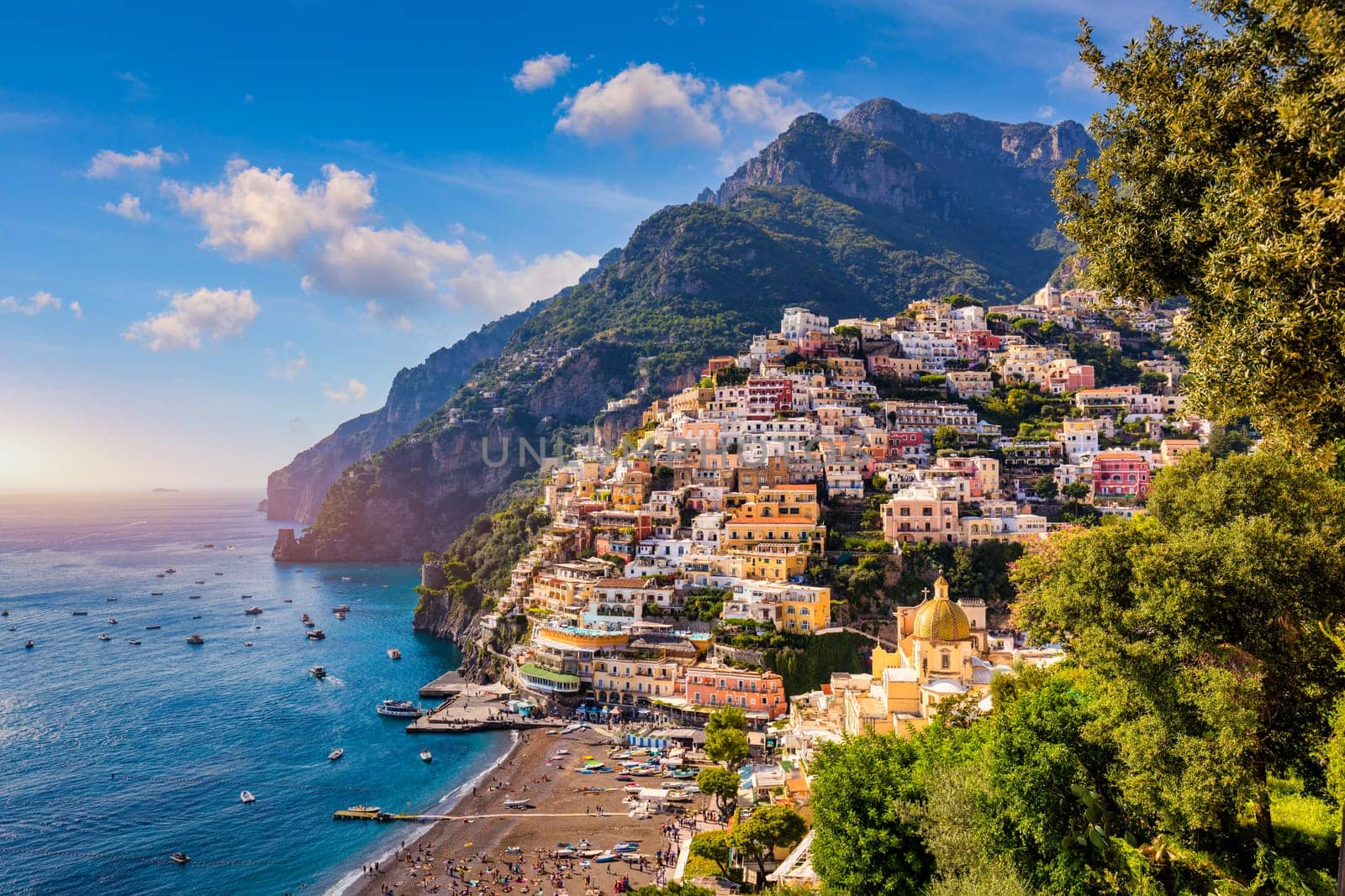 View of Positano with comfortable beach and blue sea on Amalfi Coast in Campania, Italy. Positano village on the Amalfi Coast, Salerno, Campania. Beautiful Positano, Amalfi Coast in Campania.