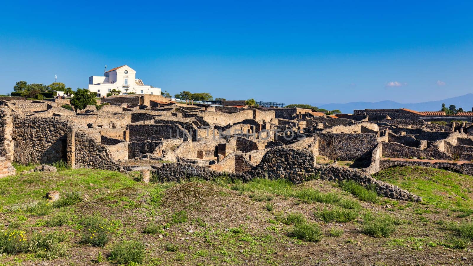 Ancient ruins of Pompei city (Scavi di Pompei), Naples, Italy. View of ancient city of Pompeii, Pompei is ancient Roman city died from eruption of Mount Vesuvius in 1st century, Naples, Italy.