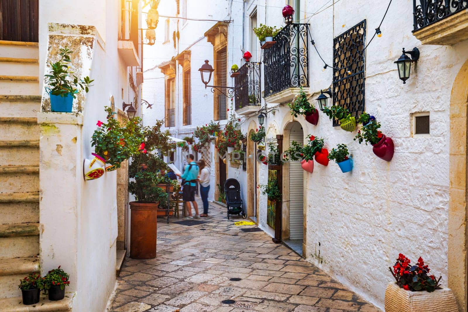 Scenic sight in Locorotondo, Bari Province, Apulia (Puglia), Italy. Characteristic streets in the Locorotondo in Puglia, Italy. Locorotondo is a town of the Metropolitan City of Bari, Apulia, Italy.