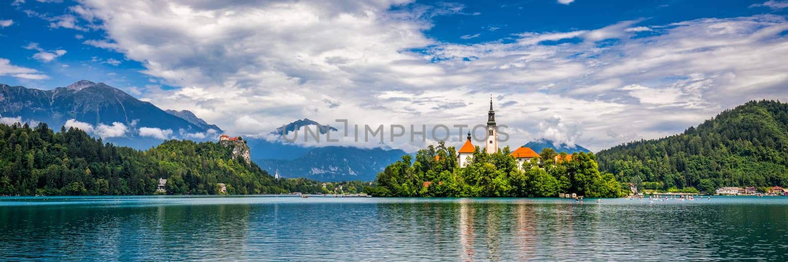 Lake Bled in Slovenia. Beautiful mountains and Bled lake with small Pilgrimage Church. Bled lake and island with Pilgrimage Church of the Assumption of Maria. Bled, Slovenia, Europe.