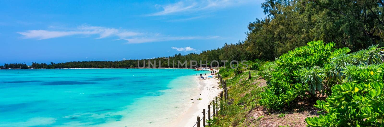 Mauritius beach aerial view of Mont Choisy beach in Grand Baie, Pereybere North. Mont Choisy, public beach in Mauritius island, Africa. Beautiful beach of Mont Choisy in Mauritius, drone aerial view.