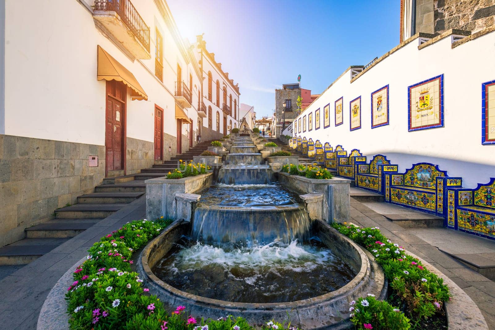 Famous Paseo de Canarias street on Firgas, Gran Canaria, Canary Islands, Spain. Fountain of natural mineral water in Firgas, Gran Canaria. Village Firgas at Gran Canaria, Paseo de Canarias