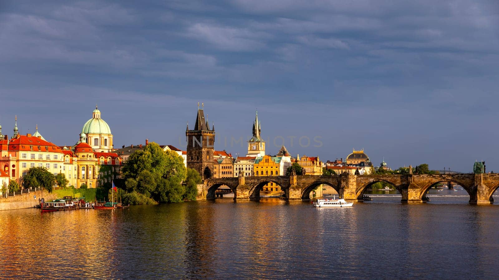 Charles Bridge sunset view of the Old Town pier architecture, Charles Bridge over Vltava river in Prague, Czechia. Old Town of Prague with Charles Bridge, Prague, Czech Republic.