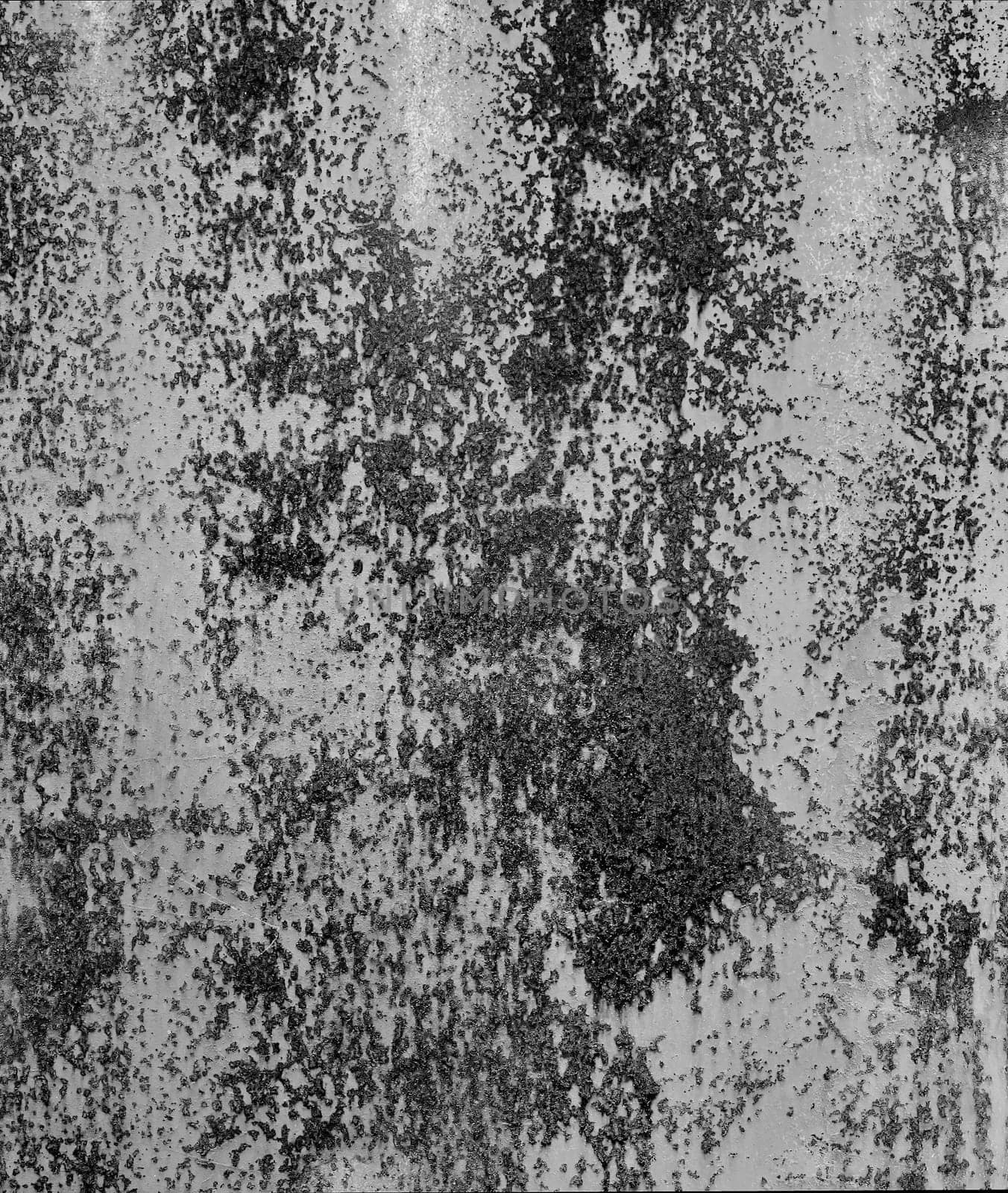 Black and white grunge rust metal texture. Monochrome backdrop of rusty surface dark gray hues. Close-up abstract background of aged old iron, scratch pattern, worn, distress area, corrosion details