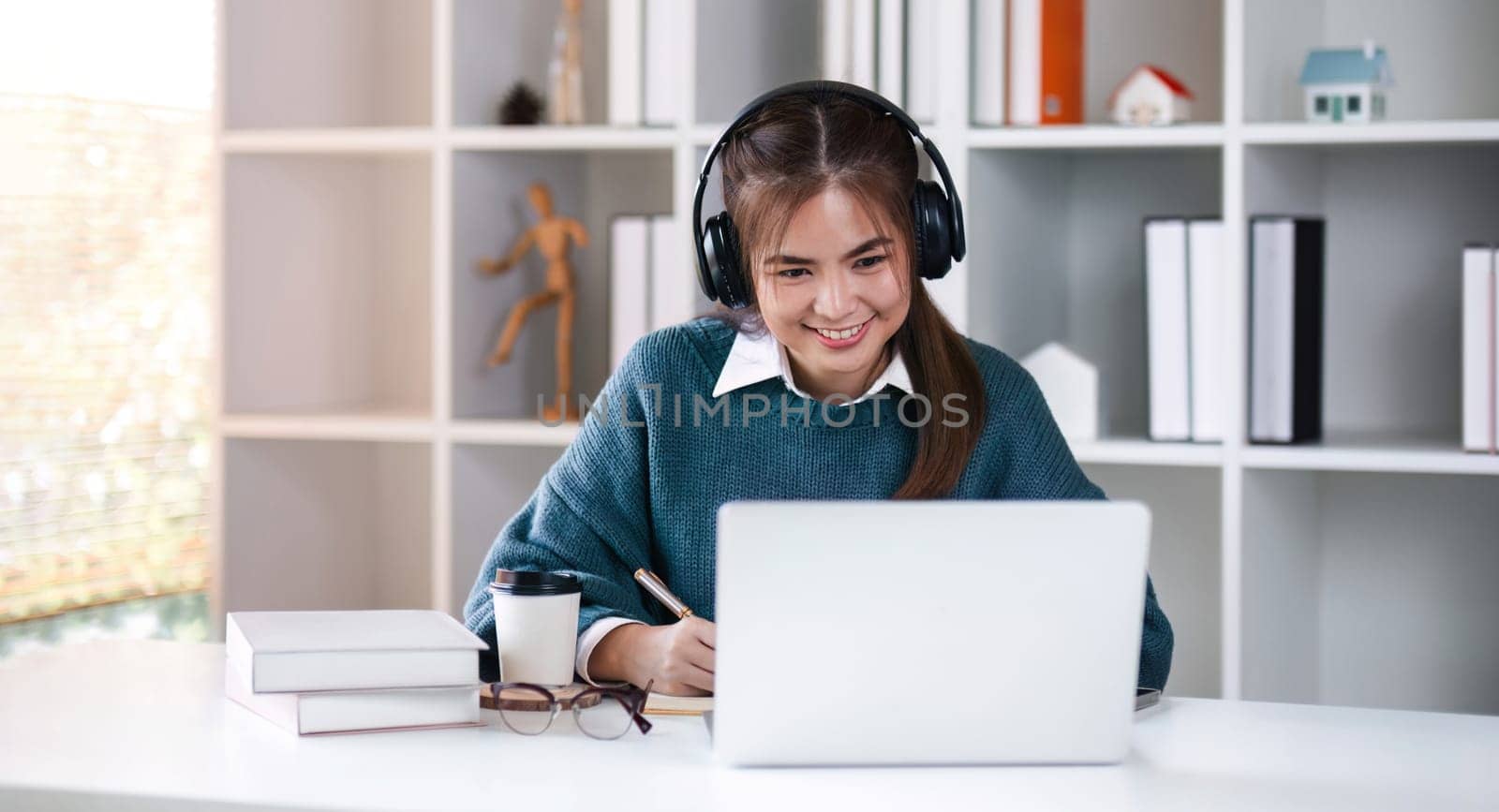 Asian girl student online learning class study online video call zoom teacher, Happy asian girl learn english language online with computer laptop by wichayada