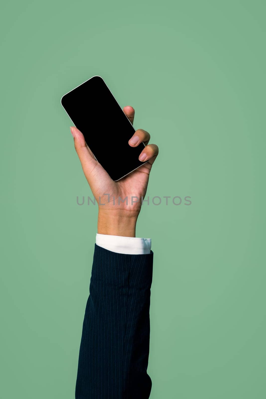 Hand holding smartphone device on isolated background for start up mobile tech company. Eco-friendly green business promoting electronic waste policy idea. Quaint