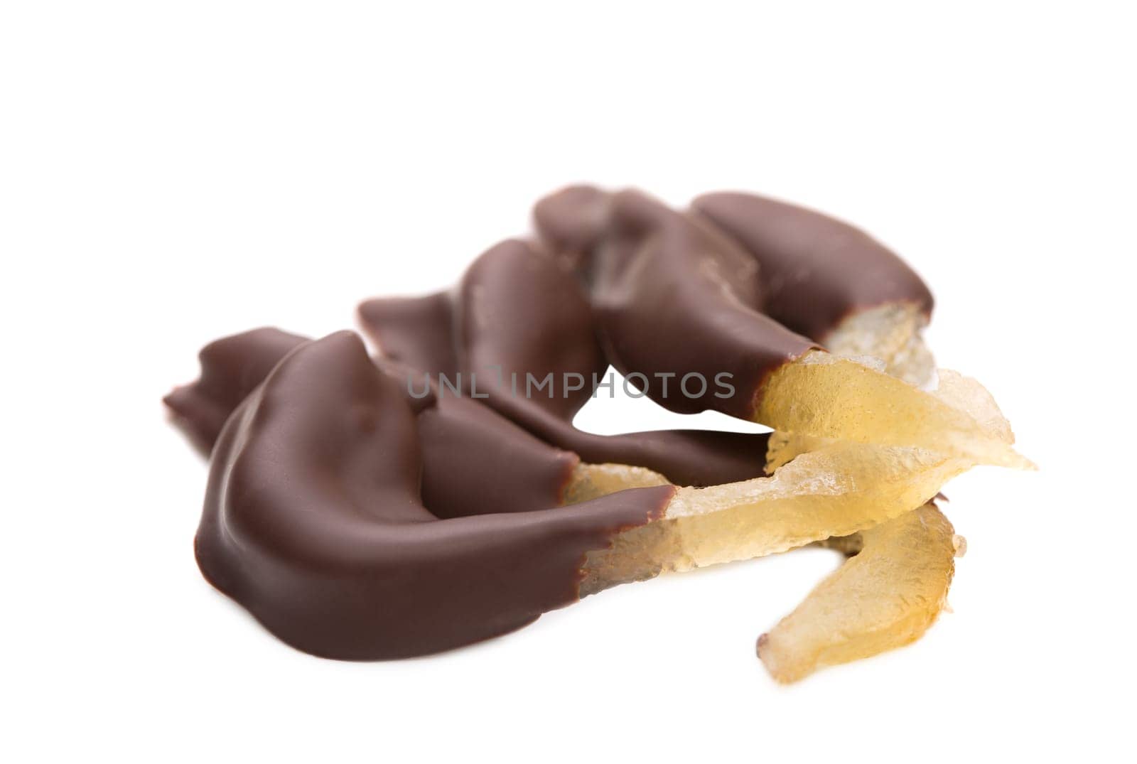 Image of lemon slices dipped in chocolate, isolated on white