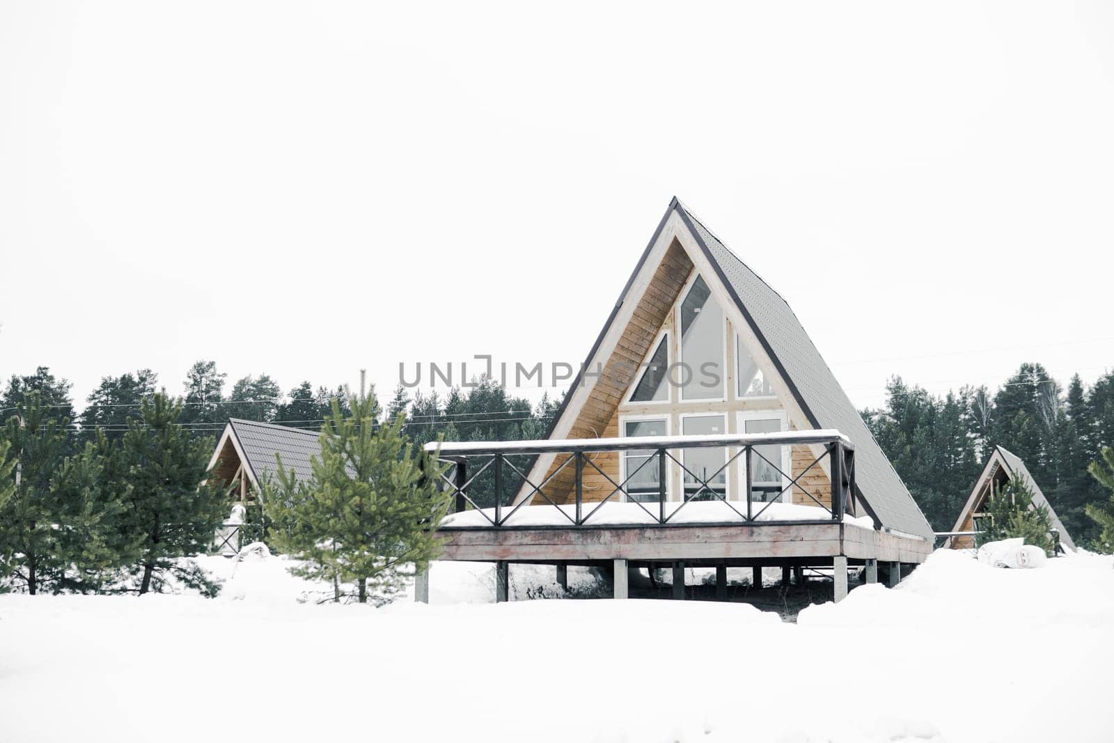 A country house in nature in winter. Rest in an ecologically clean place in winter. Glamping in nature