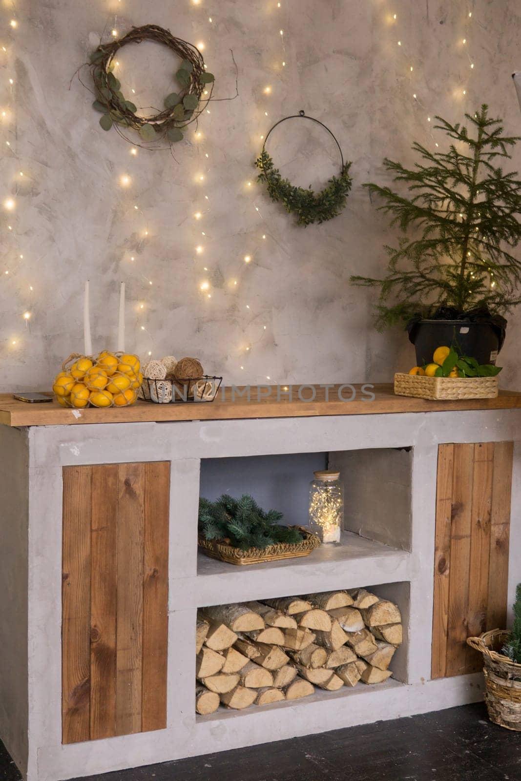 The interior of the Scandinavian-style living room, decorated for the Christmas holidays. Kitchen cupboard in a private house