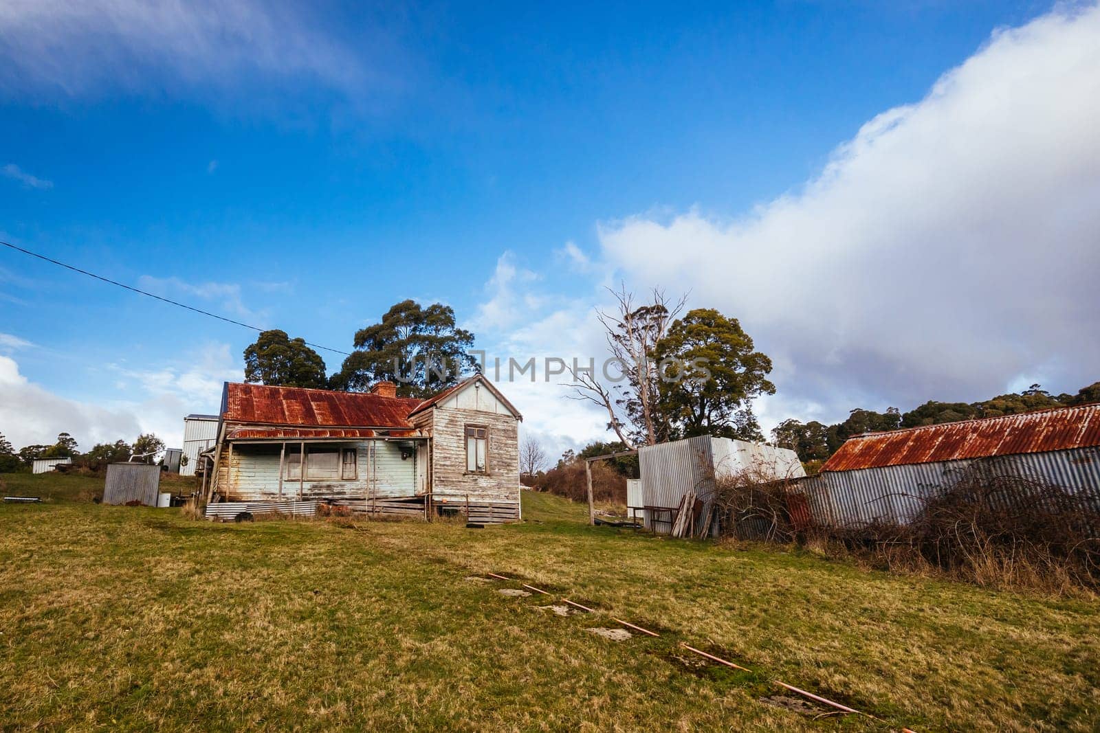 A delapidated rustic country house near Trentham on a winter's afternoon in Victoria,. Australia