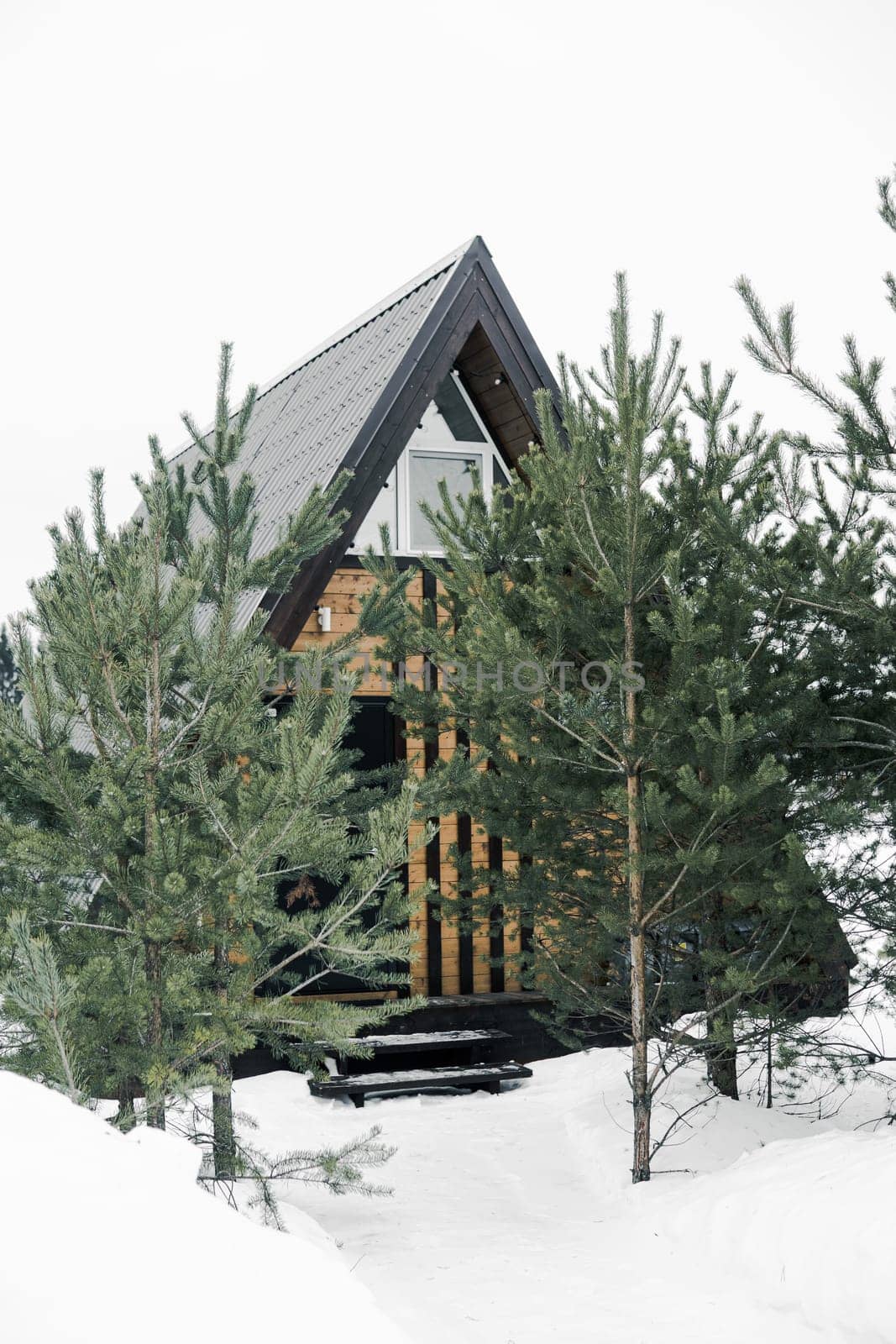 A country house in nature in winter. Rest in an ecologically clean place in winter. Glamping in nature