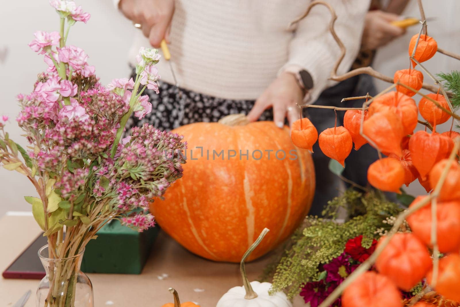 Creating a floral composition in a pumpkin. Making decor with your own hands