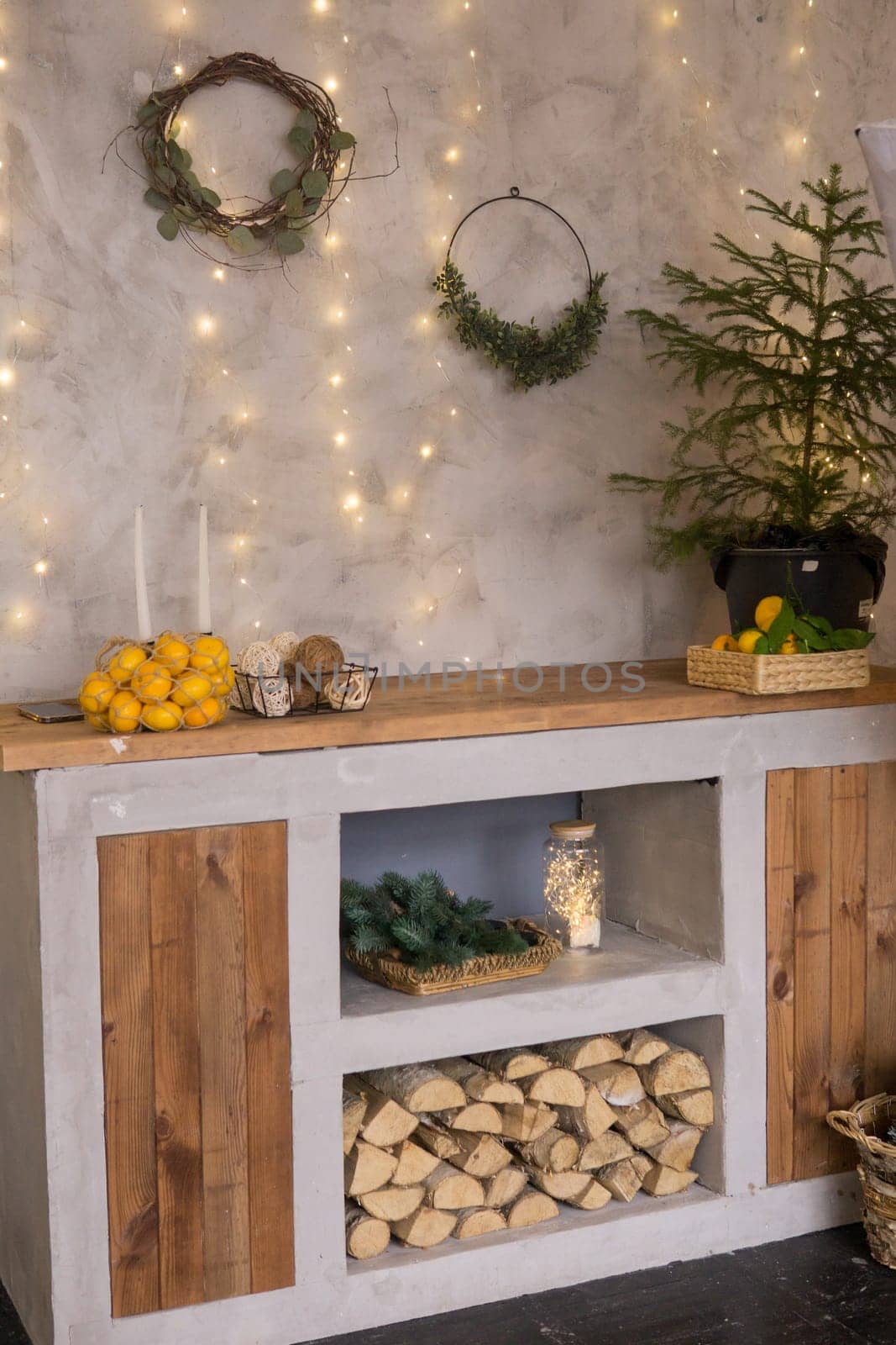 The interior of the Scandinavian-style living room, decorated for the Christmas holidays. Kitchen cupboard in a private house